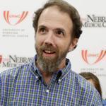 Dr. Richard Sacra arrived at a news conference at the Nebraska Medical Center in Omaha, Nebraska, on Thursday.