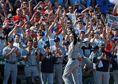 Derek Jeter walked off the field to a standing ovation after the last at-bat of his career.
