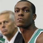 Rajon Rondo would be OK with remaining a Celtic and Danny Ainge (background) would like him back ? at the right price. Elise Amendola/Associated Press