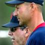 Dave Wallace (left) worked with the pitchers as Terry Francona managed the 2004 ballclub to the historic title.