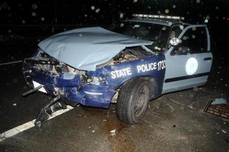 This State Police cruiser struck a Honda Pilot last year, injuring the Chelmsford couple inside. 
Police officers on patrol face an array of distractions while driving, including laptops mounted in their vehicles. 
