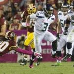 Quarterback Russell Wilson (3) carried the Seahawks past the Redskins. EPA/MICHAEL REYNOLDS