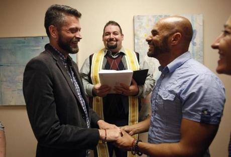 Jim Derrick and Alfie Travassos were married by Rev. Justin Lopez at the Salt Lake County Government Complex in Salt Lake City, Utah. 
