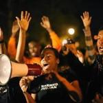 Demonstrators march through the streets protesting the October 8 killing of 18-year-old Vonderrit Myers Jr. by an off duty St. Louis police officer.