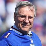 The Fox broadcast team seemed to be more concerned with new Bills owner Terry Pegula, rather than the potential season-ending injury suffered by Jerod Mayo.  (Photo by Brett Carlsen/Getty Images)