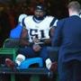Jerod Mayo was taken to the locker room on a cart Sunday.