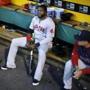Boston Red Sox's David Ortiz, left, sits in the dugout next to manager John Farrell before taking the field for a baseball game against the Pittsburgh Pirates in Pittsburgh Thursday, Sept. 18, 2014. The Pirates won 3-2. (AP Photo/Gene J. Puskar)