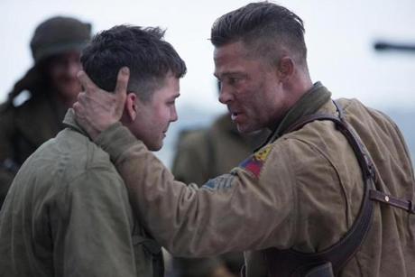 Brad Pitt as Sergeant ?War-daddy? Collier and Logan Lerman as a new recruit.
