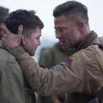 Brad Pitt as Sergeant ?War-daddy? Collier and Logan Lerman as a new recruit.