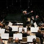Conductor Thierry Fischer and pianist Rudolf Buchbinder performing with the Boston Symphony Orchestra on Friday night.