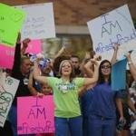 Nurses rallied in support of Texas Health Presbyterian Hospital, where Ebola patient Thomas Eric Duncan was treated.
