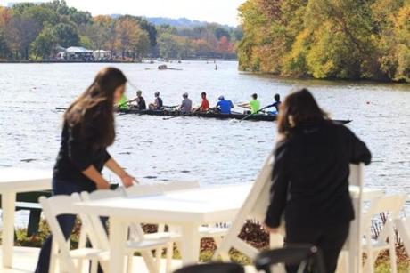 Workers of BNY Mellon, a financial services firm, readied its hospitality tent for the Head of the Charles Regatta.
