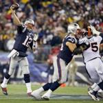 Tom Brady had to ?wait a year? to play against Peyton Manning, and he shined in Sunday?s edition with four TD passes. Matthew J. Lee/Globe Staff