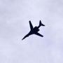 A military plane of the US-led coalition circled above the Turkey-Syria border Saturday.