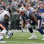 New England Patriots defensive tackle Vince Wilfork (75) starts to move from the line of scrimmage against the Chicago Bears in the second half of an NFL football game on Sunday, Oct. 26, 2014, in Foxborough, Mass. (AP Photo/Elise Amendola)
