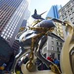 The unicorn statue, now freshly coated in gold and palladium, was returned to its post of more than 100 years.