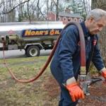Russ Berg delivered heating oil for Noar?s Oil, of Worcester. Dealers may see an uptick in business as prices moderate.