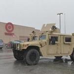 An armored military Humvee of the Missouri National Guard was stationed outside a Target department store in Jennings, Mo., on November 26.