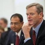 Governor-elect Charlie Baker sat with UMass Amherst Chancellor Kumble Subbaswamy during a visit to the campus Wednesday.