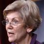 Senator Elizabeth Warren, shown speaking at a news conference Wednesday, is upset that the spending bill contains changes to the 2010 Dodd-Frank law.