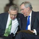 Senate Majority Leader Harry Reid (left) talked with Senate Minority Leader Mitch McConnell on Capitol Hill Wednesday.