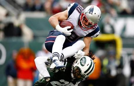 Danny Amendola leaped to avoid the Jets' Calvin Pryor in the first quarter.
