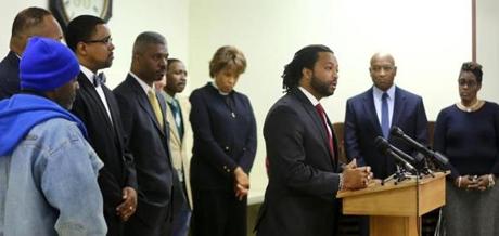 State Representative Evandro C. Carvalho spoke, at Twelfth Baptist Church as a group of clergy and others called for calm between police and the community on Monday.
