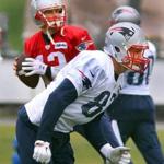 Could Rob Gronkowski (foreground) and Tom Brady get some quality time on the bench Sunday against the Bills? History says it is unlikely. Boston Globe staff photo by John Tlumacki.