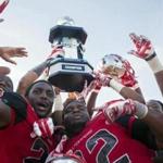 Western Kentucky players celebrate their nail-biting win in the Bahamas BowlAP Photo/The Daily News, Austin Anthony
