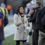 CBS sideline reporter Jenny Dell in the second half of an NFL football game between the New England Patriots and Miami Dolphins Sunday, Dec. 14, 2014, in Foxborough, Mass. (AP Photo/Charles Krupa)