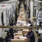 Packages are sorted for delivery at a FedEx facility in Marietta, Ga., in December.