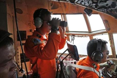 An Indonesian Air Force C-130 airplane searched over the Karimata Strait Monday.
