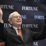 Billionaire investor Warren Buffett acknowledges the audience as he speaks on the topic of 