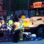 Emergency workers removed children who complained of pain after a school bus accident in Plymouth on Thursday.
