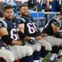 The Patriots? offensive line ? (from left) Sebastian Vollmer, Ryan Wendell, Bryan Stork, Dan Connolly, and Nate Solder ? with have their hands full with Haloti Ngata and the Ravens.