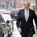 Former New York Republican Gov. George Pataki walks through the snow Monday, Jan. 12, 2015, in Concord, N.H. during a visit to the nation?s earliest presidential primary state. Pataki is considering a run for the 2016 presidential election. (AP Photo/Jim Cole)