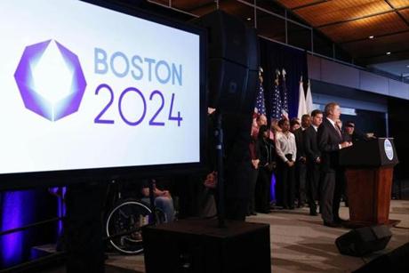 US Olympic Committee president Lawrence F. Probst III , flanked by Boston mayor Martin J. Walsh, talked about the selection of Boston as the USOC?s applicant city to host the 2024 Olympics.
