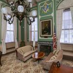 Governor Charlie Baker settled in for his second day of work at the State House on Monday, in the austere office of former Governor Deval Patrick's chief of staff.