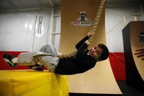 Kian Afsharian, 4, tested an ?American Ninja Warrior?-inspired course at Danvers?s Gymja Warrior. 

