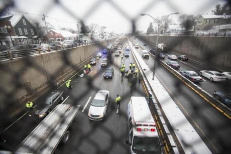 Traffic built behind protesters who blocked the Southeast Expressway northbound in Milton on Thursday morning.
