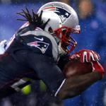 The Patriots? LeGarrette Blount averaged 4.9 yards per carry on his 30 attempts in Sunday?s AFC title game against the Colts. He also scored three times. (Photo by Elsa/Getty Images)