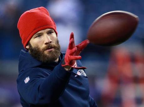 01/18/15: Foxborough, MA: Patriots wide reciever Julian Edelman works on his one handed cathing skills before the game. The New England Patriots hosted the Indianapolis Colts in the AFC Championship Game at Gillette Stadium. (Globe Staff Photo/Jim Davis) section:sports topic:Patriots-Colts
