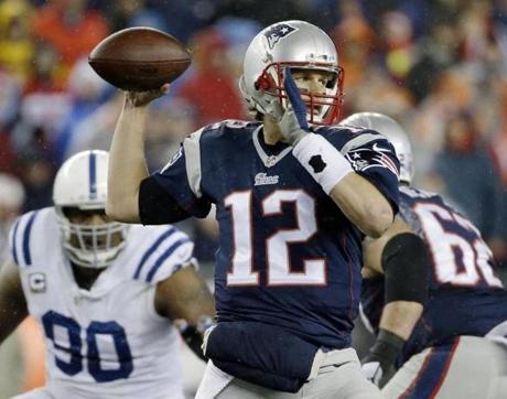 The NFL is investigating whether the Patriots deflated footballs that were used in their AFC championship game victory over the Colts. (AP Photo/Matt Slocum, File)
