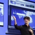 Microsoft's Joe Belfiore, corporate vice president of Operating Systems Group, speaks at an event demonstrating new features of its flagship operating system Windows at the company's headquarters Wednesday, Jan. 21, 2015, in Redmond, Wash. Executives demonstrated how they said the new Windows is designed to provide a more consistent experience and a common platform for software apps on different devices, from personal computers to tablets, smartphones and even the company's Xbox gaming console. (AP Photo/Elaine Thompson)