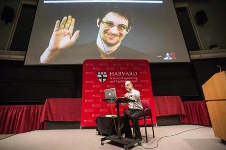 Bruce Schneier (bottom) video chats with Edward Snowden. 
