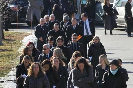 Mourners left funeral services for Dr. Michael J. Davidson at Temple Beth Elohim in Wellesley. 
