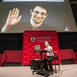 Bruce Schneier (bottom) video chats with Edward Snowden. 