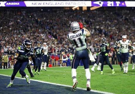 GLENDALE, AZ - FEBRUARY 01: Julian Edelman #11 of the New England Patriots catches a three yard touchdown pass in the fourth quarter against the Seattle Seahawks during Super Bowl XLIX at University of Phoenix Stadium on February 1, 2015 in Glendale, Arizona. (Photo by Mike Ehrmann/Getty Images)
