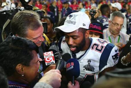 GLENDALE, AZ - FEBRUARY 01: Darrelle Revis #24 of the New England Patriots talks to the media after defeating the Seattle Seahawks 28-24 to win Super Bowl XLIX at University of Phoenix Stadium on February 1, 2015 in Glendale, Arizona. (Photo by Elsa/Getty Images)
