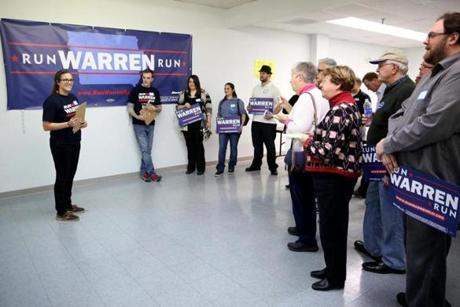 Beth Farvour (left) speaks about current issues during the Run Warren Run meeting building support for Senator Elizabeth Warren to enter the 2016 election The Iowa Liberal group Run Warren Run held its first meeting in Des Moines, Iowa Thursday, January 29th, 2015. (Conrad Schmidt/Associated Press for The Boston Globe)
